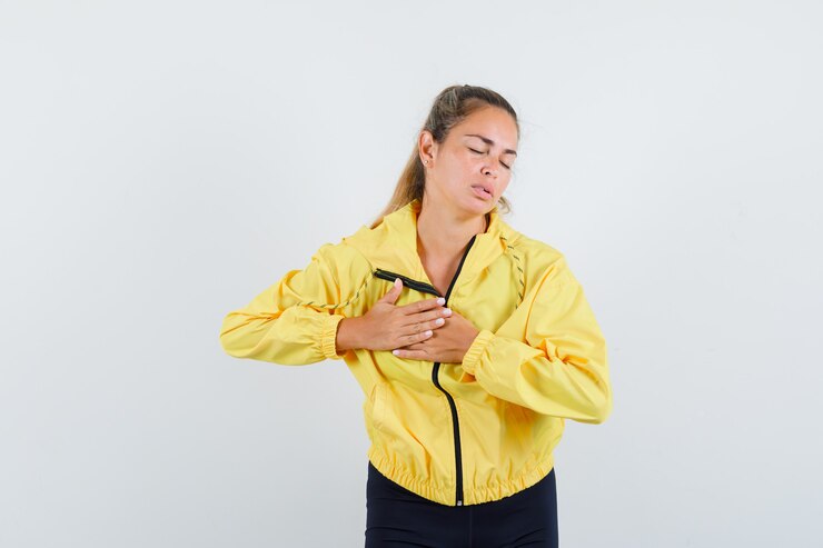 Blonde Woman Yellow Bomber Jacket Black Pants Having Heart Pain Looking Exhausted 176474 57402