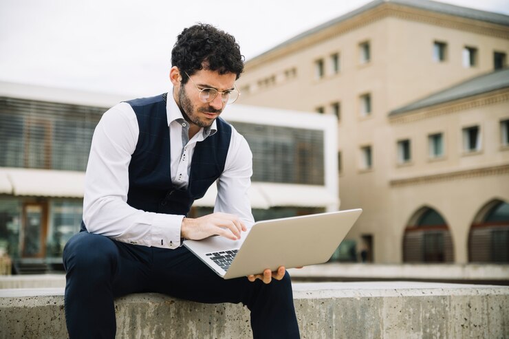 Modern Businessman Using Laptop Outdoors 23 2148171121