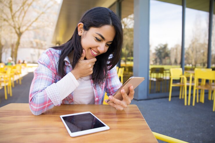 Smiling Lady Using Tablet Smartphone Outdoor Cafe 1262 19052